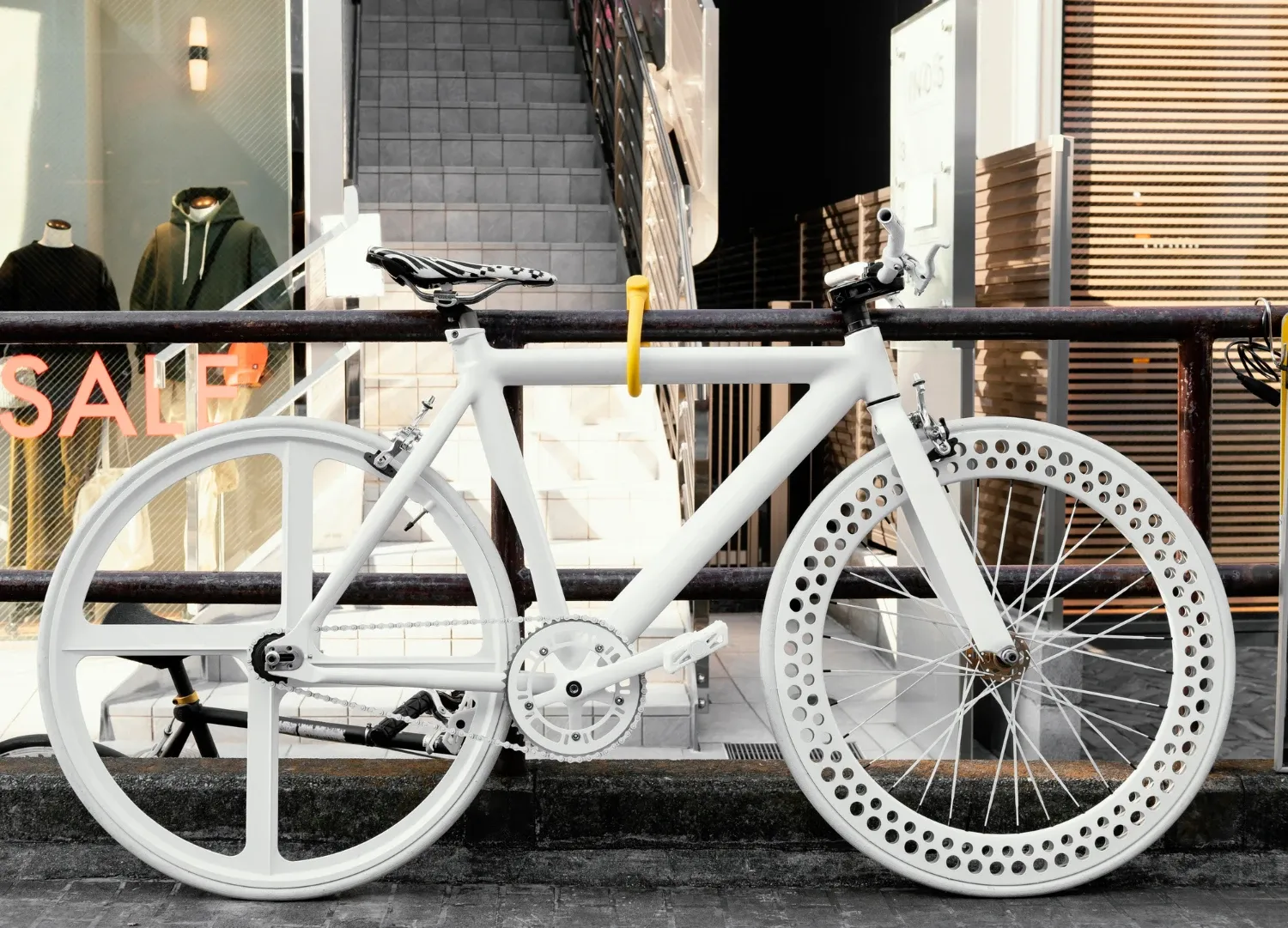 Custom road bicycle assembled from AliExpress components on a city street